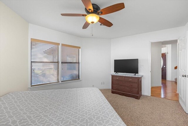 182 Cedar Hill Dr, Livingston, TX 77351 - carpeted bedroom featuring ceiling fan