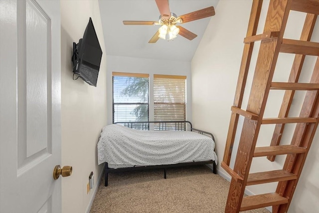 182 Cedar Hill Dr, Livingston, TX 77351 - carpeted bedroom with vaulted ceiling and a ceiling fan