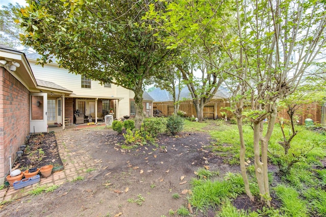 view of yard featuring fence