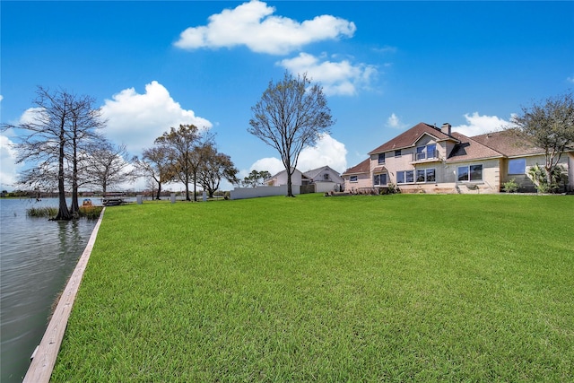 view of yard with a water view