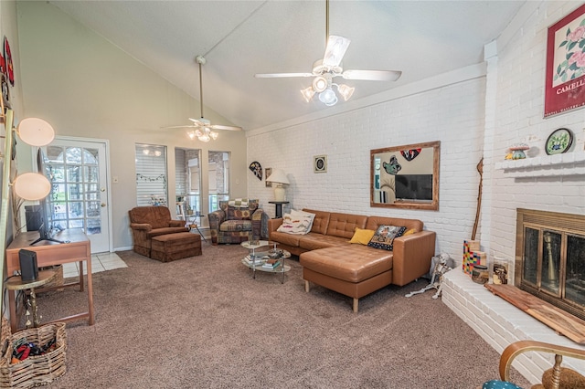 carpeted living room featuring a brick fireplace, a ceiling fan, brick wall, and high vaulted ceiling
