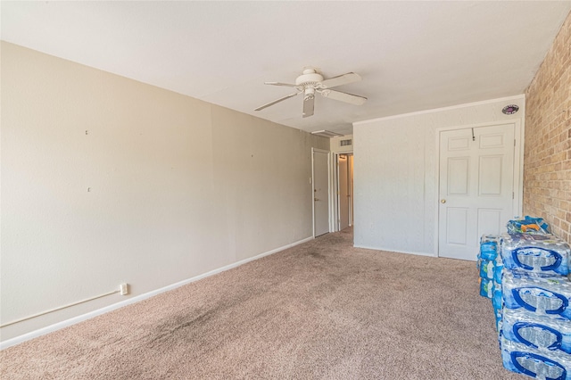 carpeted empty room with a ceiling fan