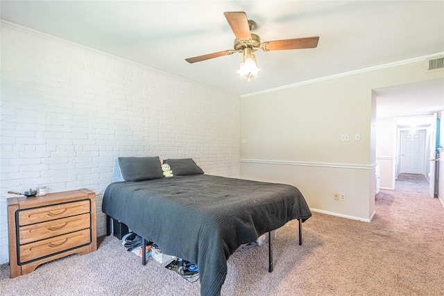 bedroom with baseboards, light carpet, ornamental molding, and brick wall