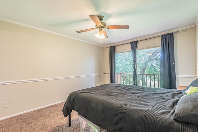carpeted bedroom featuring ceiling fan, baseboards, and ornamental molding