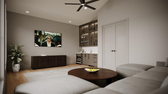 2244 N Blvd, Houston, TX 77098 - living room featuring wet bar, light wood-style floors, vaulted ceiling, a ceiling fan, and recessed lighting