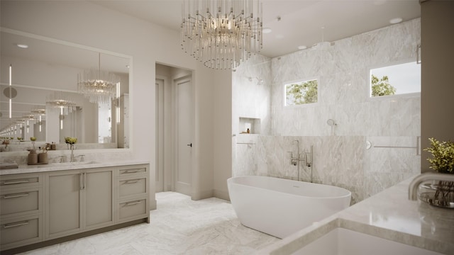 2244 N Blvd, Houston, TX 77098 - bathroom featuring marble finish floor, a freestanding tub, an inviting chandelier, and vanity