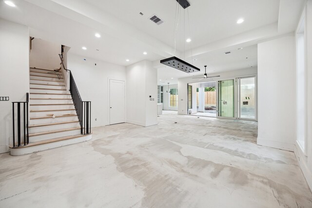 2244 N Blvd, Houston, TX 77098 - unfurnished living room featuring concrete floors, stairs, ceiling fan, visible vents, and recessed lighting