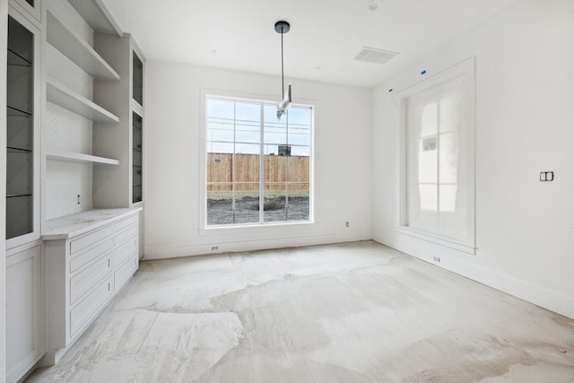 2244 N Blvd, Houston, TX 77098 - unfurnished dining area with baseboards and visible vents