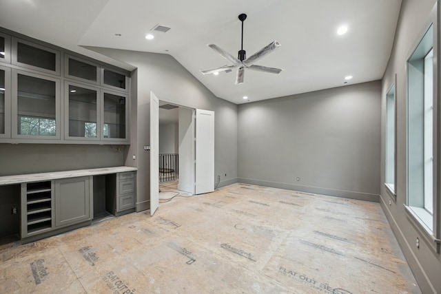 2244 N Blvd, Houston, TX 77098 - interior space featuring vaulted ceiling, multiple windows, visible vents, and baseboards