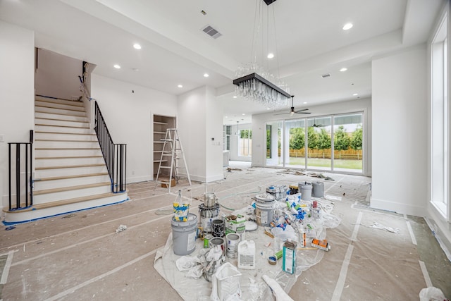 2244 N Blvd, Houston, TX 77098 - unfurnished living room with recessed lighting, stairway, baseboards, and a ceiling fan