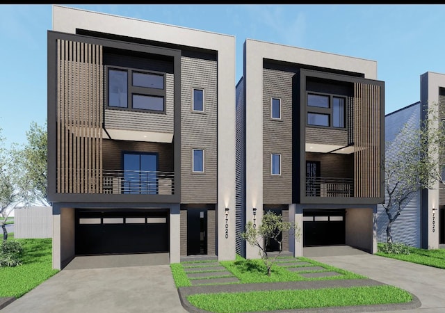 5505 Hershe St, Houston, TX 77020 - modern home with stucco siding, a balcony, an attached garage, and driveway