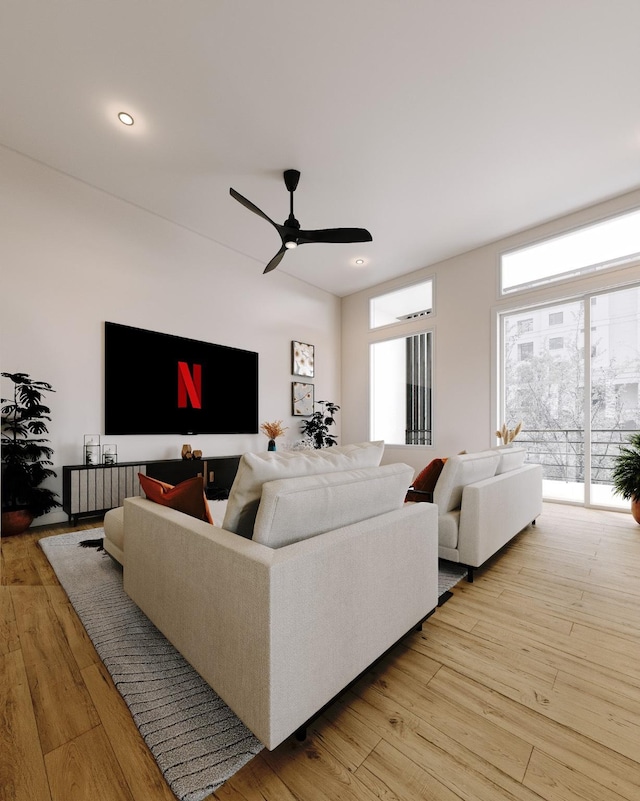5505 Hershe St, Houston, TX 77020 - living room featuring light wood-type flooring, ceiling fan, and recessed lighting