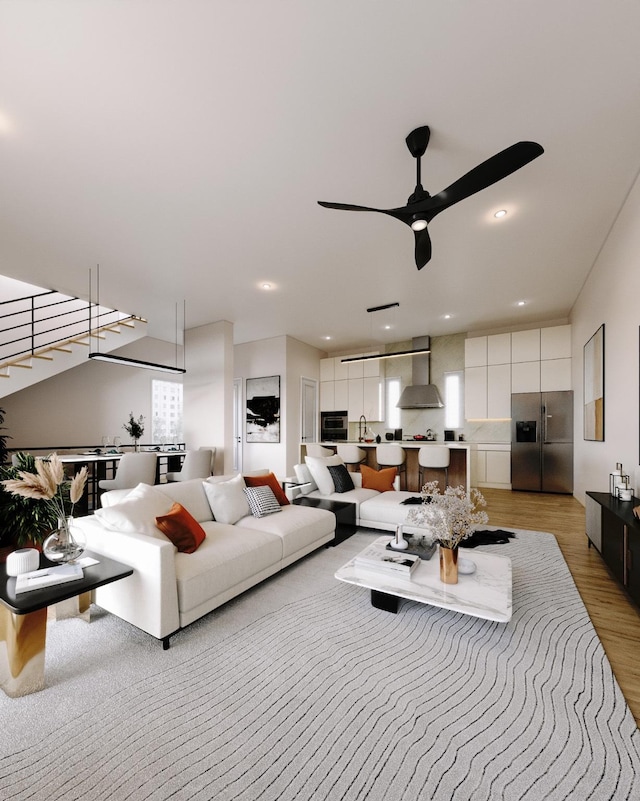 5505 Hershe St, Houston, TX 77020 - living area with light wood-style floors and ceiling fan