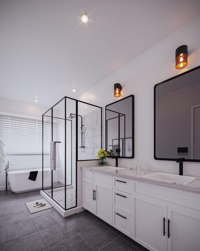 5505 Hershe St, Houston, TX 77020 - bathroom featuring double vanity, a shower stall, a soaking tub, recessed lighting, and tile patterned flooring