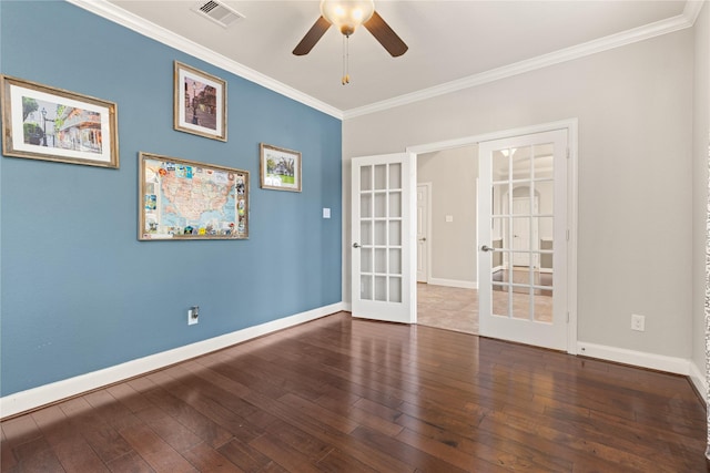 unfurnished room with crown molding, a ceiling fan, visible vents, french doors, and baseboards