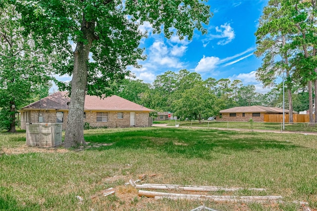 view of yard featuring fence