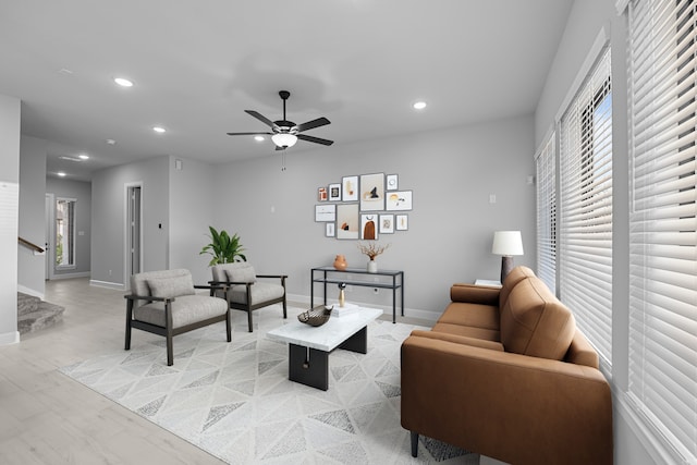 living area featuring light wood-style flooring, recessed lighting, and a wealth of natural light