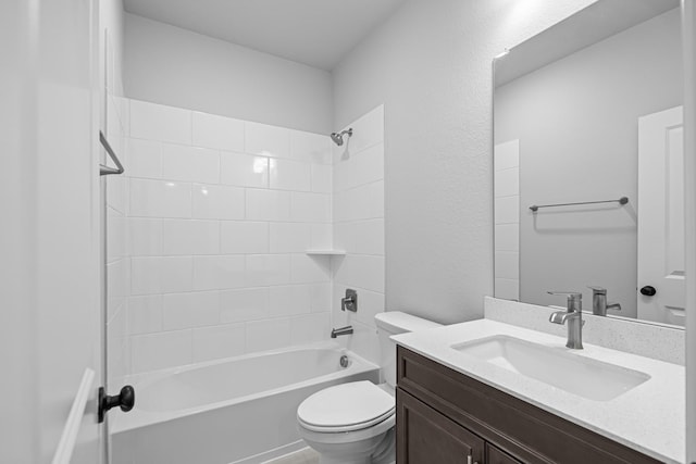 full bathroom featuring vanity, shower / tub combination, and toilet