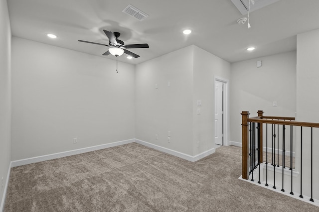 unfurnished room featuring visible vents, recessed lighting, carpet, attic access, and ceiling fan