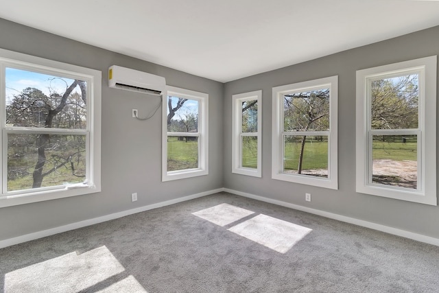 71 Deer Run Cir, Coldspring, TX 77331 - unfurnished room with a wall unit AC, carpet, and baseboards