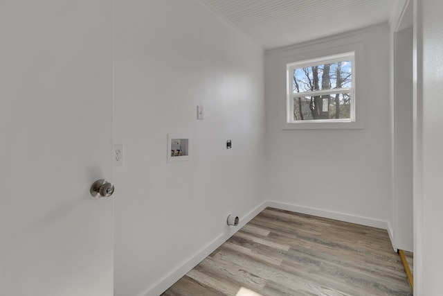 71 Deer Run Cir, Coldspring, TX 77331 - laundry area featuring electric dryer hookup, light wood finished floors, baseboards, and hookup for a washing machine