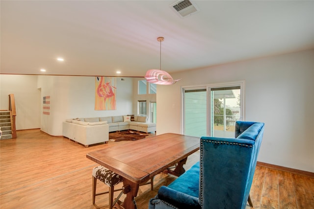 456 S Burnett Dr, Baytown, TX 77520 - dining space featuring recessed lighting, light wood-style floors, stairway, and visible vents