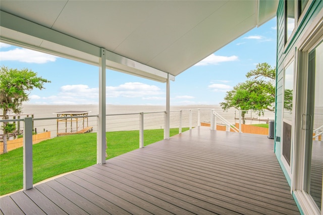 456 S Burnett Dr, Baytown, TX 77520 - deck featuring a fenced backyard and a lawn