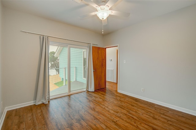 456 S Burnett Dr, Baytown, TX 77520 - empty room with baseboards, visible vents, wood finished floors, and a ceiling fan