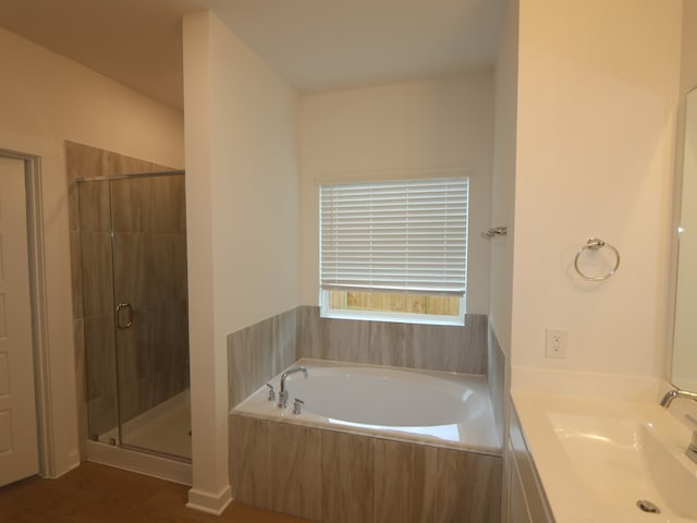8634 Sun Coral Dr, Cypress, TX 77433 - full bathroom with a garden tub, a stall shower, and vanity