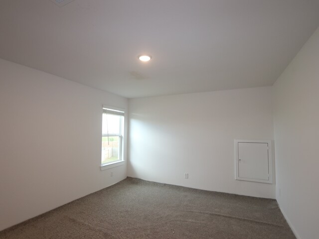 8634 Sun Coral Dr, Cypress, TX 77433 - spare room with dark carpet