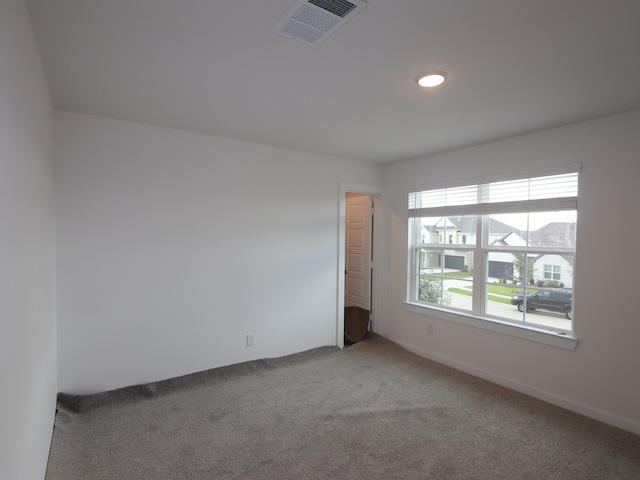 8634 Sun Coral Dr, Cypress, TX 77433 - empty room with light colored carpet and recessed lighting