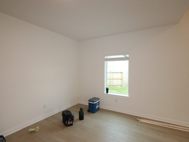 8634 Sun Coral Dr, Cypress, TX 77433 - empty room featuring wood finished floors