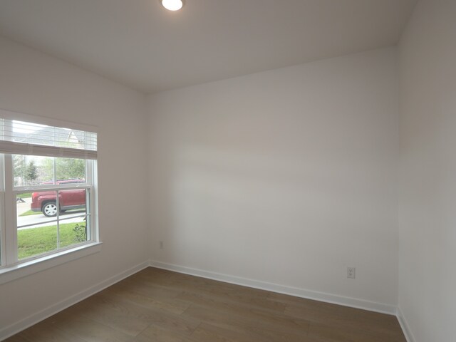 8634 Sun Coral Dr, Cypress, TX 77433 - spare room with wood finished floors and baseboards