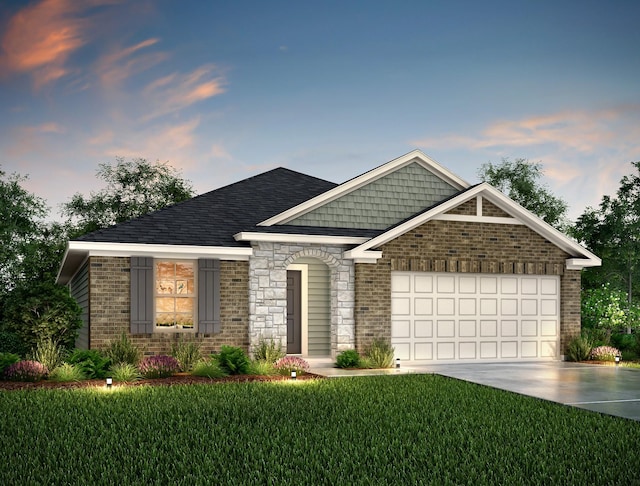 craftsman inspired home featuring a front lawn, roof with shingles, driveway, brick siding, and a garage
