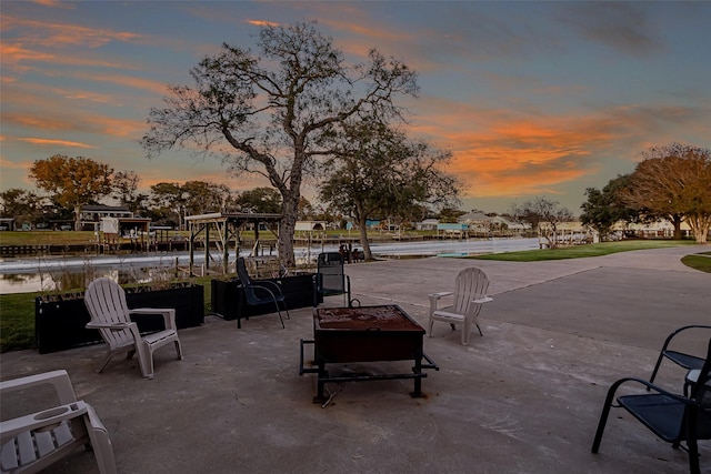 view of patio terrace at dusk
