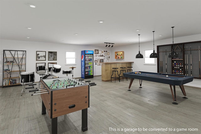 playroom with recessed lighting, a dry bar, billiards, and light wood finished floors
