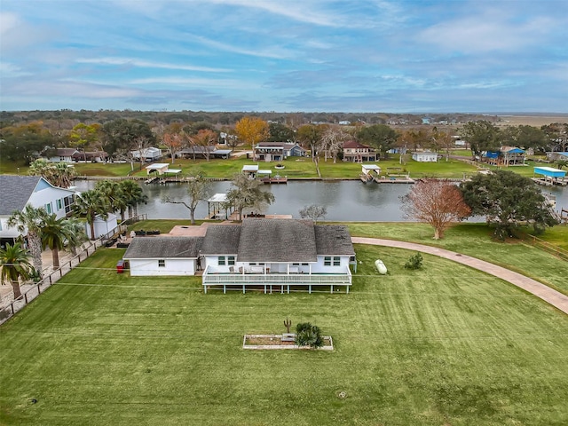bird's eye view featuring a water view and a residential view