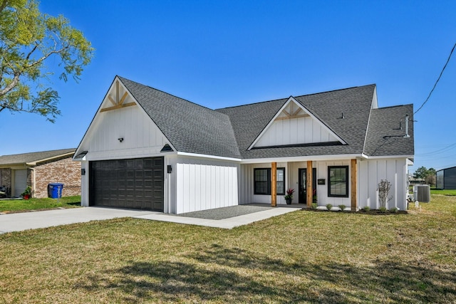 modern farmhouse featuring a front yard, central AC, concrete driveway, a garage, and board and batten siding
