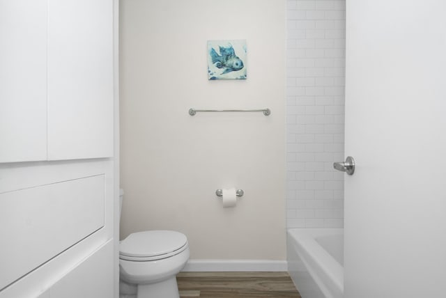 89 Bayou Ln, Kemah, TX 77565 - full bathroom featuring toilet and wood finished floors