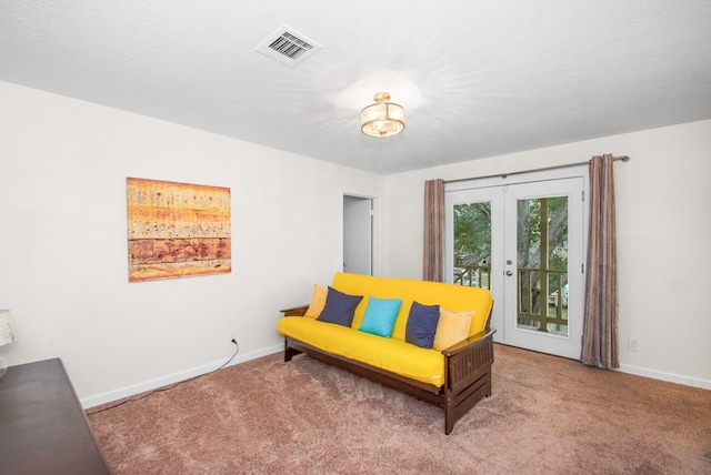 89 Bayou Ln, Kemah, TX 77565 - living area with carpet and french doors