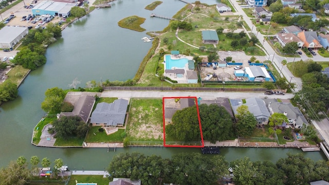 89 Bayou Ln, Kemah, TX 77565 - aerial view of residential area featuring a nearby body of water and property parcel outlined