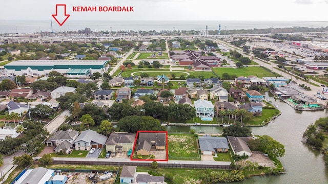 89 Bayou Ln, Kemah, TX 77565 - aerial perspective of suburban area featuring property boundaries highlighted and a nearby body of water