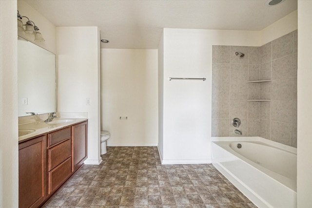 806 Sun Lodge Dr, Houston, TX 77073 - bathroom with baseboards, double vanity, toilet, a sink, and shower / tub combination