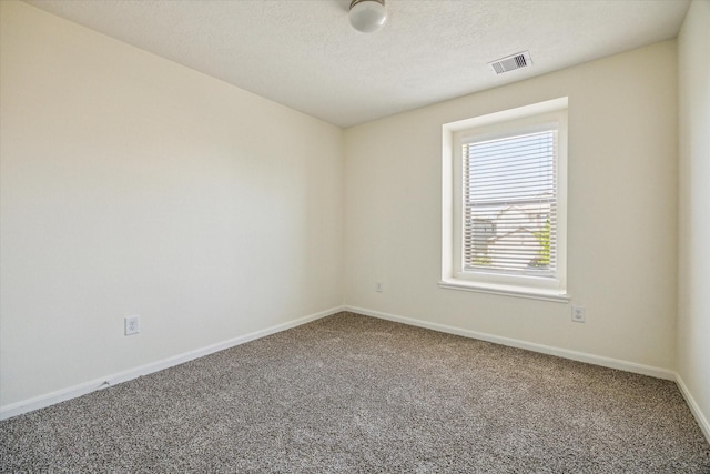 806 Sun Lodge Dr, Houston, TX 77073 - carpeted spare room featuring baseboards, a textured ceiling, and visible vents