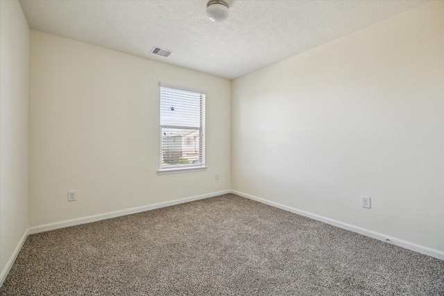 806 Sun Lodge Dr, Houston, TX 77073 - empty room featuring baseboards, visible vents, carpet flooring, and a textured ceiling
