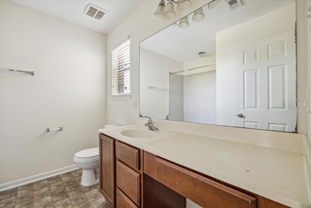806 Sun Lodge Dr, Houston, TX 77073 - full bath featuring baseboards, visible vents, toilet, and vanity