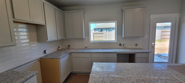 4314 Maple Root Ln, Pinehurst, TX 77362 - kitchen featuring decorative backsplash