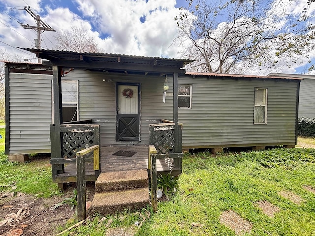 100 Upton Ln, Brazoria, TX 77422 - exterior space with metal roof