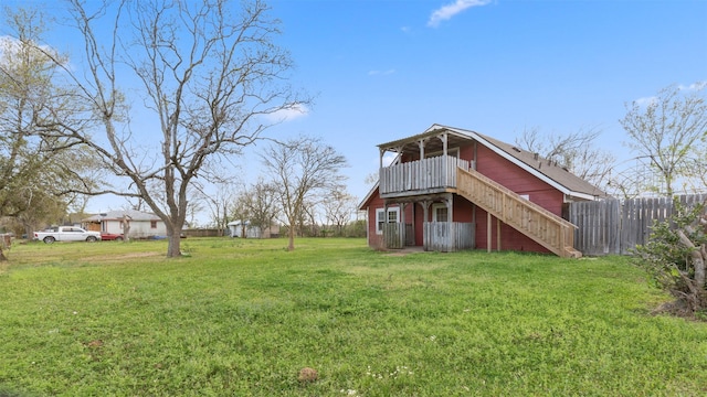 810 Robinson Rd, La Porte, TX 77571 - rear view of house featuring a yard and fence