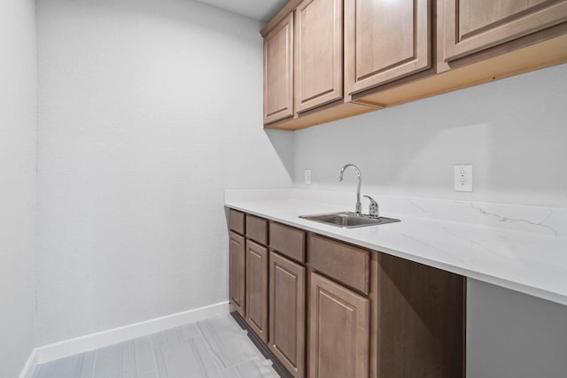 23507 Persimmon Creek Ln, Katy, TX 77493 - bar area with a sink and baseboards